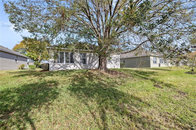 exterior space with a front yard