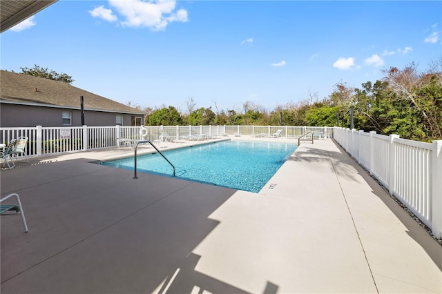 view of pool featuring a patio