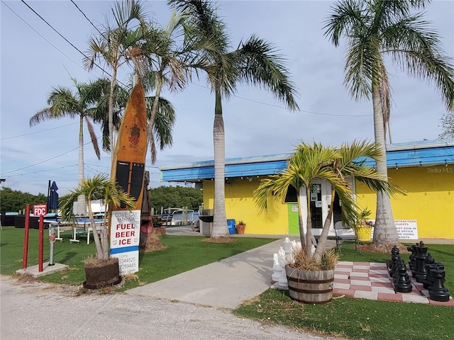 surrounding community featuring a lawn