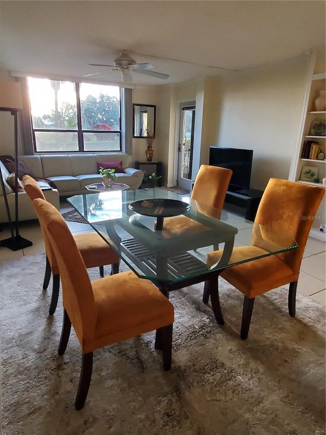 dining area with light tile patterned flooring