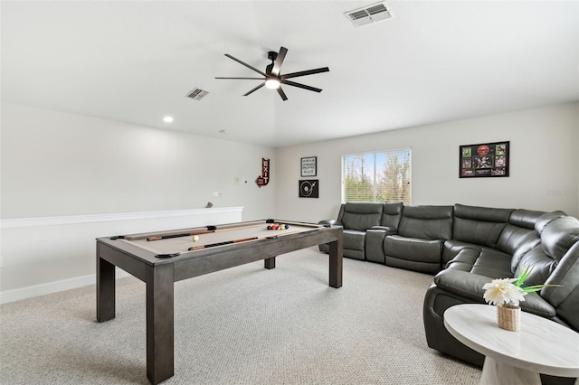 recreation room with ceiling fan and light carpet