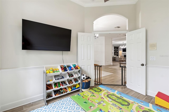 playroom with a notable chandelier