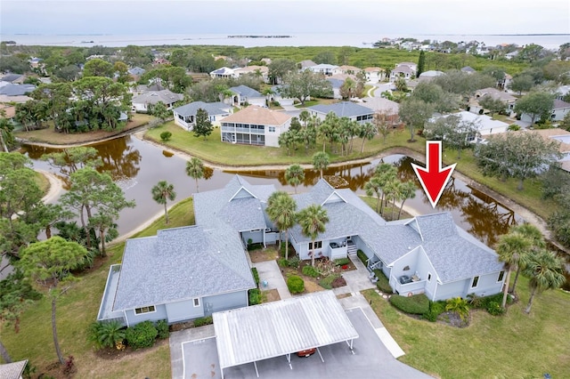 1018 Caravel Ct, Tarpon Springs, FL 34689 - aerial perspective of suburban area with a nearby body of water
