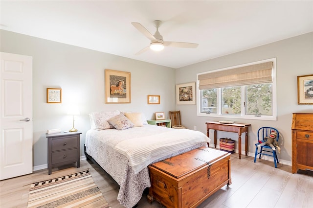 1018 Caravel Ct, Tarpon Springs, FL 34689 - bedroom with light wood finished floors and a ceiling fan