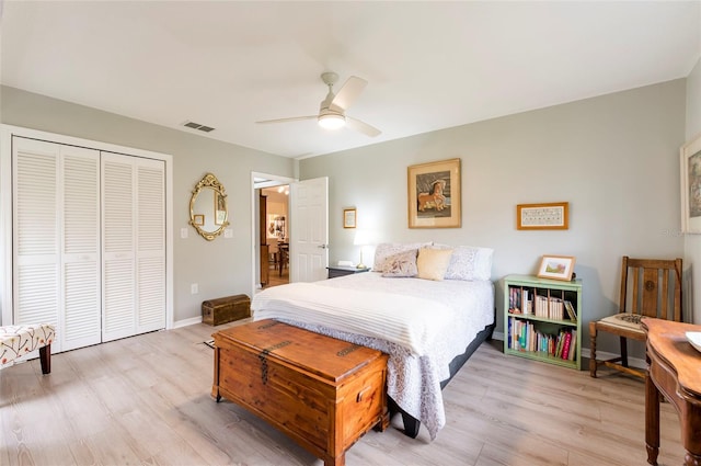 1018 Caravel Ct, Tarpon Springs, FL 34689 - bedroom with light wood-style flooring, a closet, and a ceiling fan
