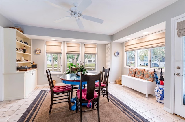 1018 Caravel Ct, Tarpon Springs, FL 34689 - dining area featuring light tile patterned floors, ceiling fan, and recessed lighting