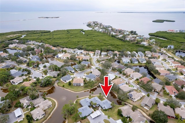 1018 Caravel Ct, Tarpon Springs, FL 34689 - aerial view of property's location featuring a nearby body of water and nearby suburban area