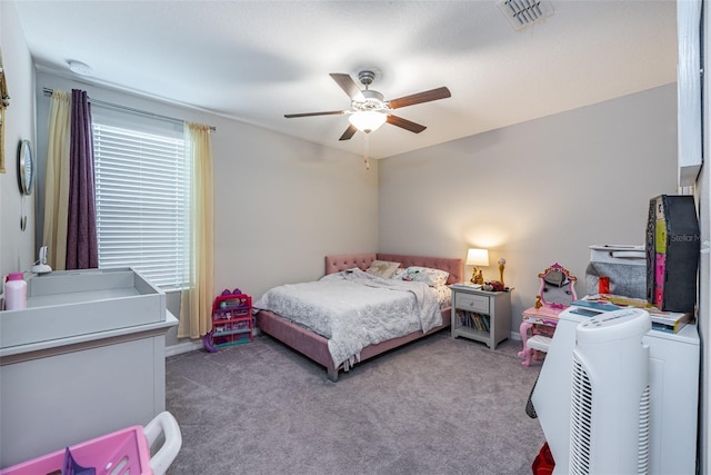 bedroom with ceiling fan and light colored carpet