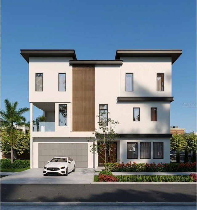 contemporary home featuring a garage and a balcony