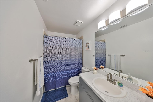 bathroom with toilet, tile patterned flooring, walk in shower, and vanity