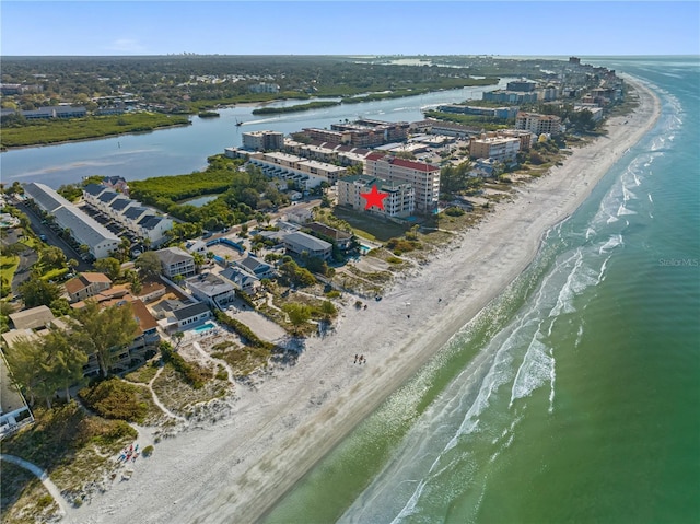 bird's eye view featuring a beach view and a water view