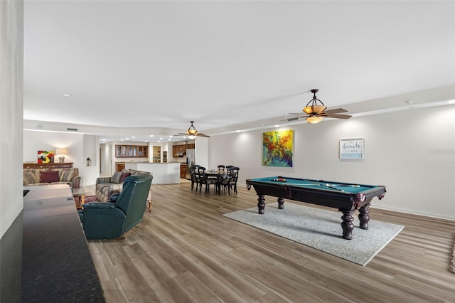 game room featuring light wood-style floors, billiards, and ceiling fan