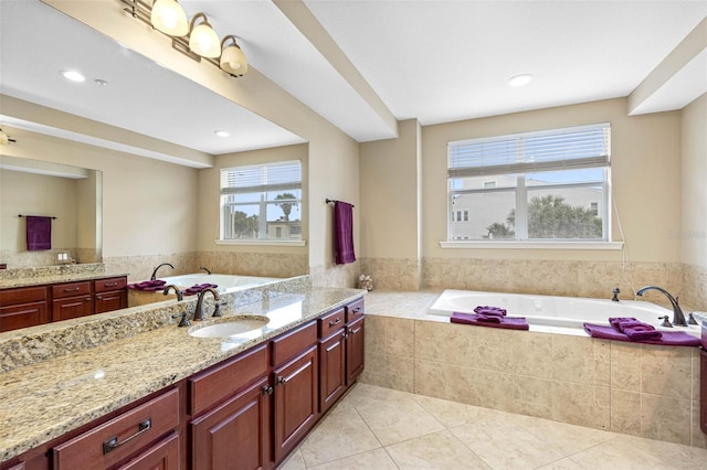 bathroom with recessed lighting, tile patterned flooring, a bath, and vanity