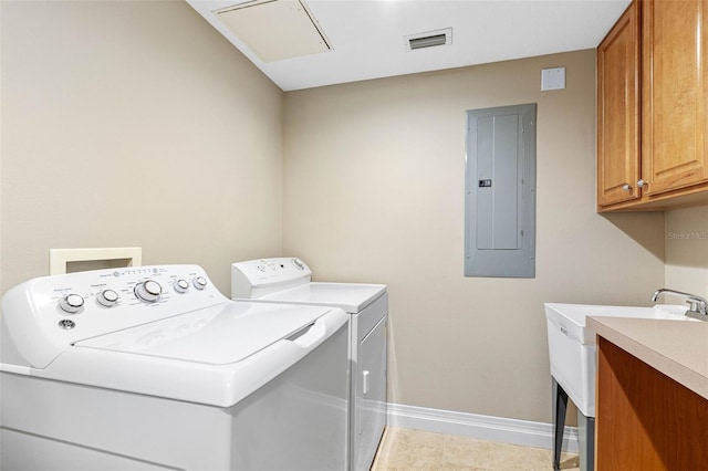 laundry area featuring cabinet space, electric panel, baseboards, visible vents, and independent washer and dryer