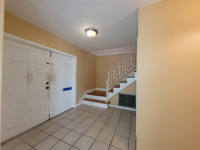 view of tiled foyer entrance