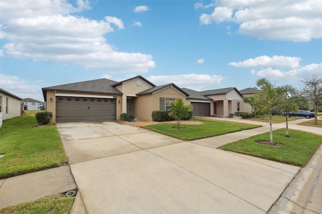 ranch-style house featuring a garage and a front yard