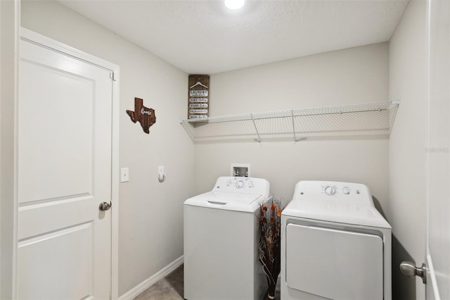 washroom featuring washer and dryer