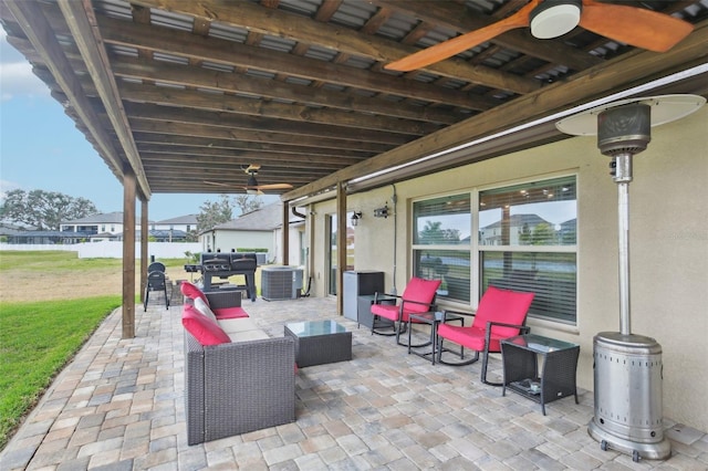 view of patio with cooling unit, ceiling fan, and an outdoor hangout area