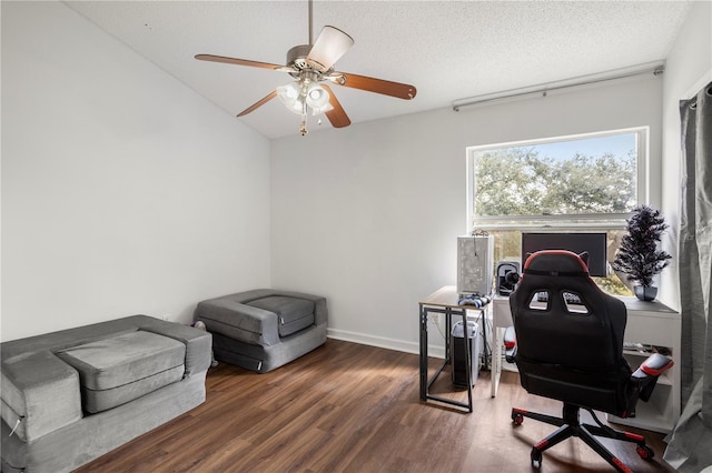 office space featuring ceiling fan, a textured ceiling, and dark hardwood / wood-style floors