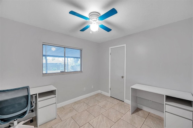 tiled office space with ceiling fan