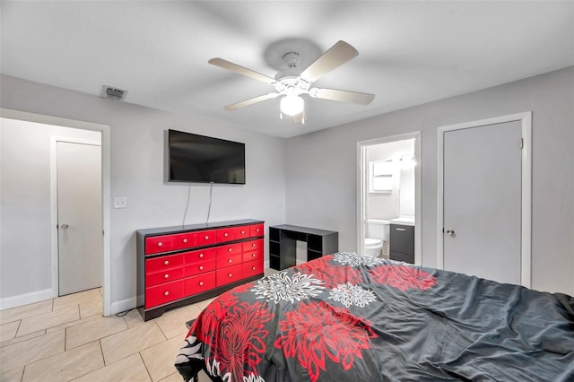 bedroom with connected bathroom, ceiling fan, and light tile patterned floors