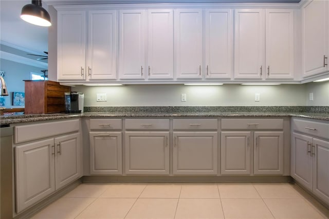 kitchen featuring ornamental molding, gray cabinetry, and light tile patterned floors