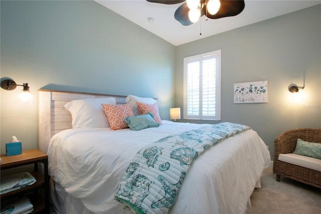 carpeted bedroom with lofted ceiling and ceiling fan