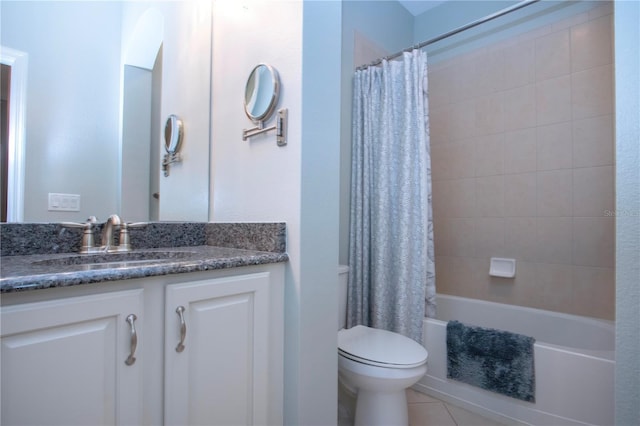 full bathroom with vanity, shower / tub combo with curtain, tile patterned floors, and toilet