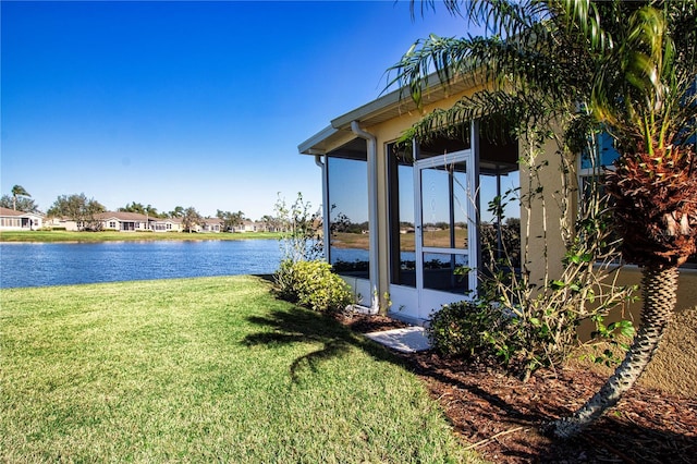 exterior space with a water view