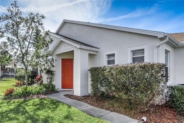 exterior space with a front lawn