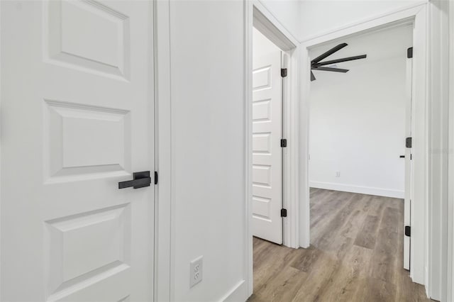 corridor featuring light hardwood / wood-style flooring