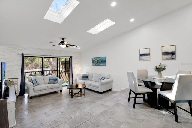 living room with high vaulted ceiling and ceiling fan