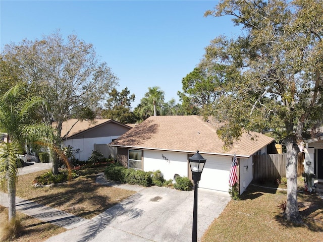 ranch-style home with a garage