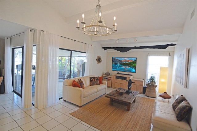 living room with an inviting chandelier, lofted ceiling with beams, and light tile patterned floors