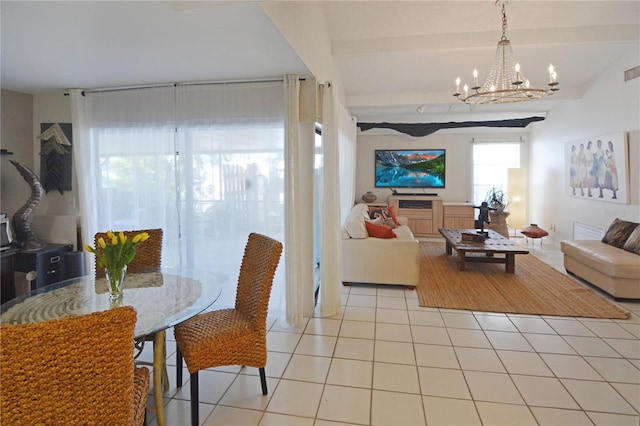 dining space featuring light tile patterned floors, beam ceiling, and a notable chandelier