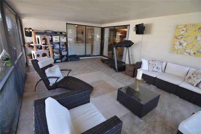 living room with tile patterned flooring