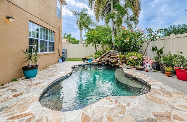 view of pool featuring pool water feature