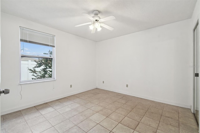 empty room featuring ceiling fan