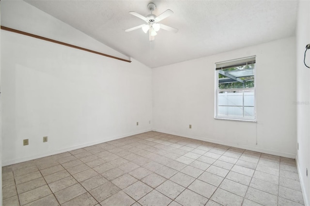 spare room with vaulted ceiling and ceiling fan