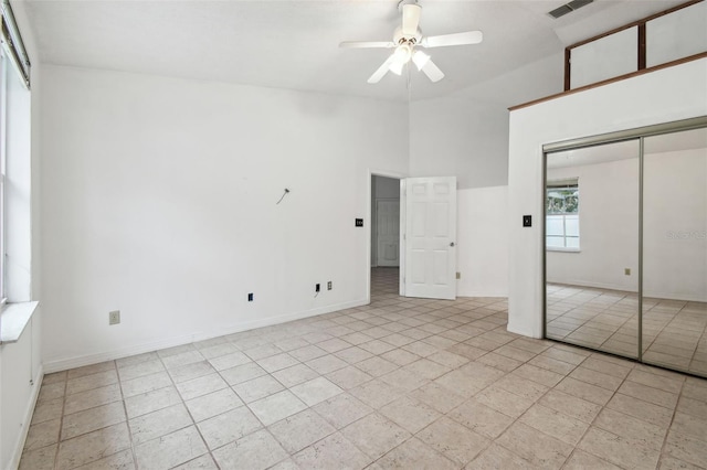 unfurnished bedroom with a closet and ceiling fan