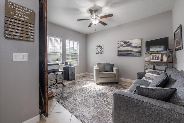 office featuring ceiling fan and tile patterned floors