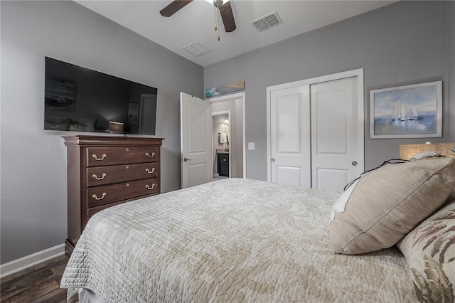 bedroom featuring dark wood-type flooring, a closet, and ceiling fan