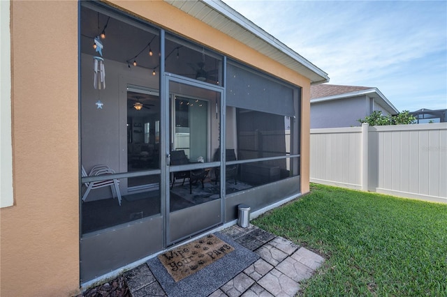 view of yard featuring a sunroom