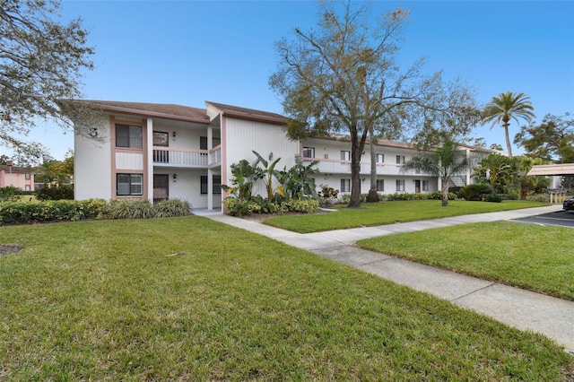 exterior space with a lawn