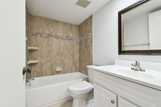 full bathroom with vanity, toilet, tiled shower / bath combo, and tile patterned flooring