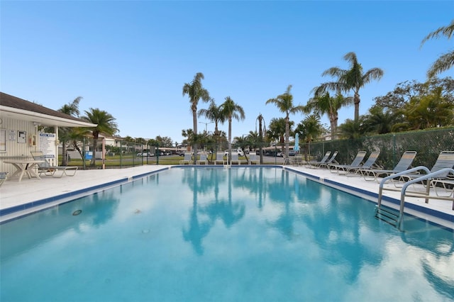 view of swimming pool with a patio area