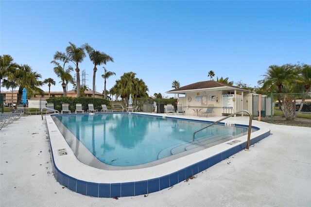 view of swimming pool featuring a patio