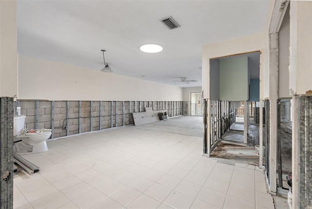 interior space with light tile patterned floors