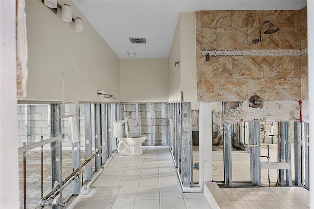 stairway featuring tile patterned floors