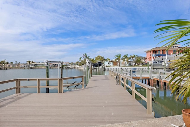 view of dock featuring a water view and boat lift